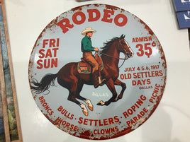 Round rodeo tin sign